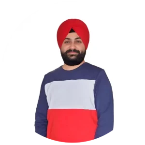 Portrait of a man wearing a red turban and a blue, white, and red sweater, smiling at the camera.
